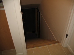 Stairs at back of kitchen