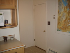 Door to garage, from back of kitchen